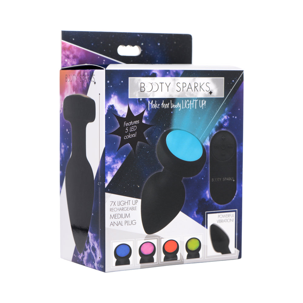 Booty Sparks Rechargeable Light Up Vibrating Anal Plug with Remote Control Medium black Booty Sparks rechargeable anal plug with blue LED cap and remote on box