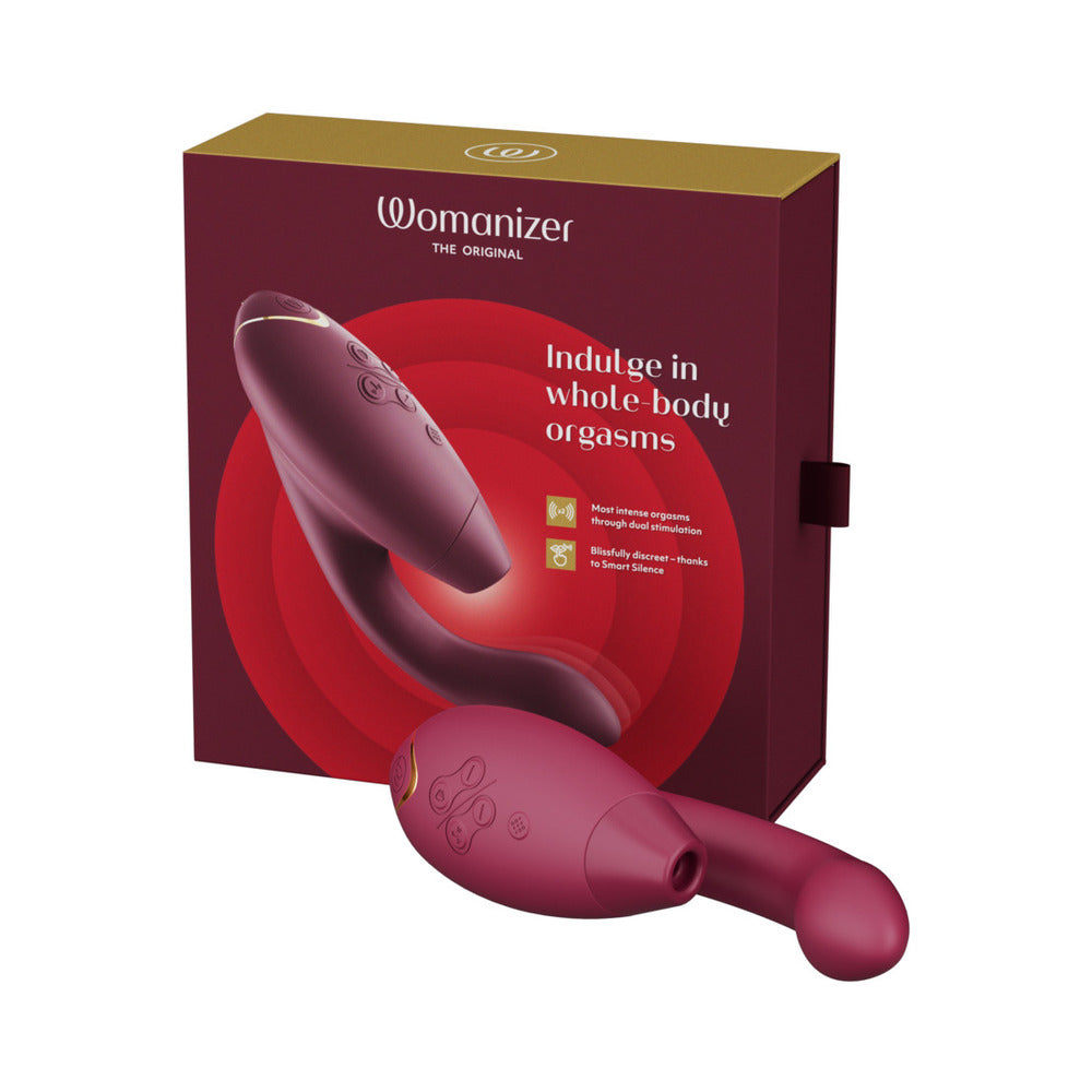 Womanizer Duo 2 Bordeaux Womanizer Duo 2 Bordeaux vibrator beside burgundy box
