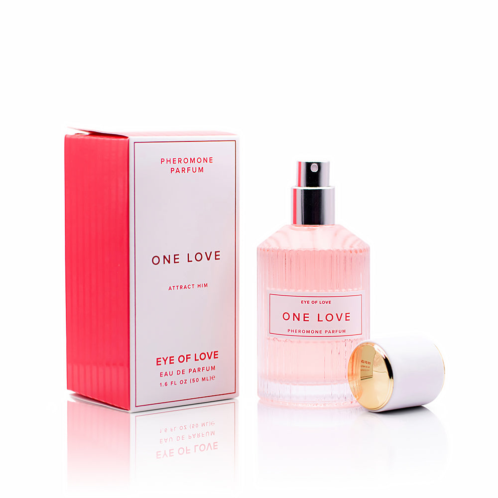 Eye of Love One Love Attract Him Pheromone Parfum 1.67 oz. pale-pink One Love spray bottle with gold cap beside red and white box