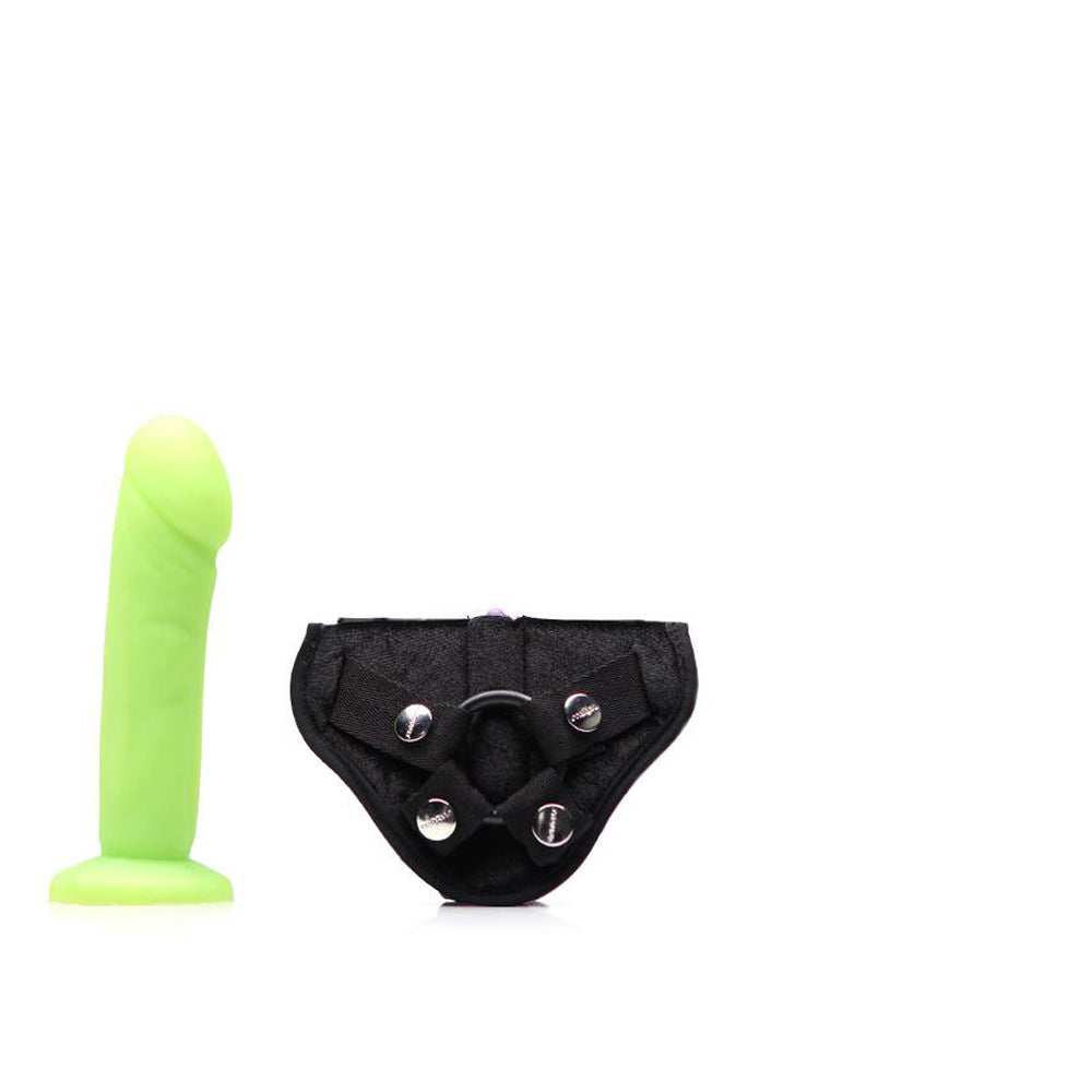 Tantus Vamp Strap-On Harness Kit Lime Bright lime Tantus Vamp dildo beside compact black harness panel