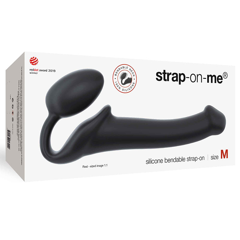 Strap-On-Me Semi-Realistic Bendable Silicone Strap-On Black M Black medium Strap-On-Me silicone strap-on displayed across white box
