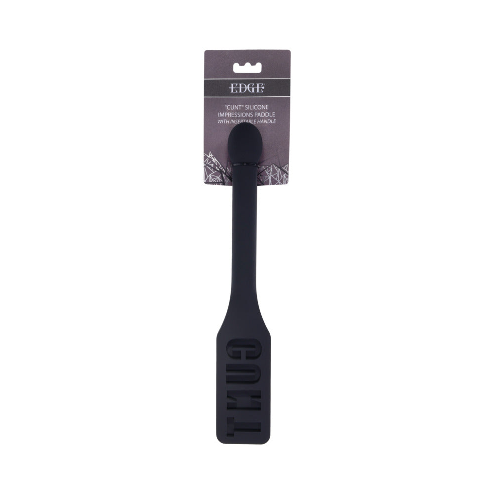 Sportsheets Edge CUNT Silicone Paddle Front hanging view of Sportsheets Edge Letter-Cutout Silicone Paddle