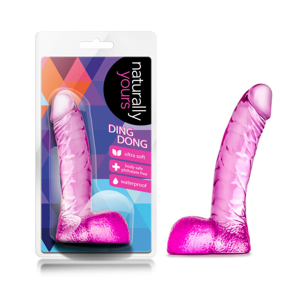 Naturally Yours Ding Dong Realistic 5.5 in. Dildo with Balls Pink Naturally Yours Ding Dong Pink dildo beside colorful retail package