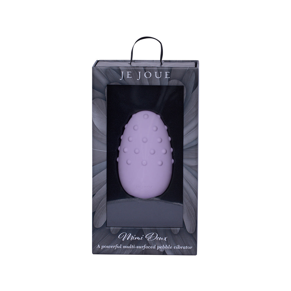 Je Joue Mimi Deux Double Sided Clitoral Vibrator Lilac lilac Je Joue Mimi Deux pebble vibrator with raised dots in black window box