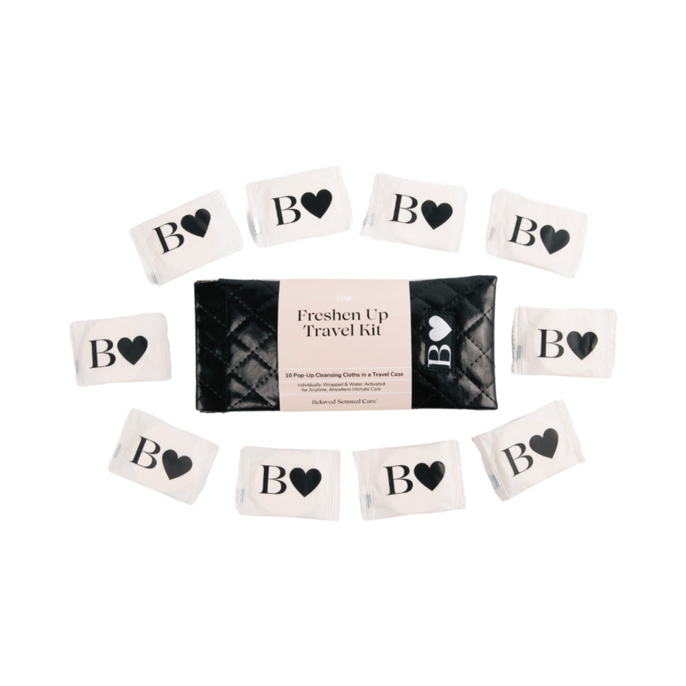 Beloved Freshen Up Travel Kit Beloved Freshen Up black travel pouch surrounded by ten wrapped cloths