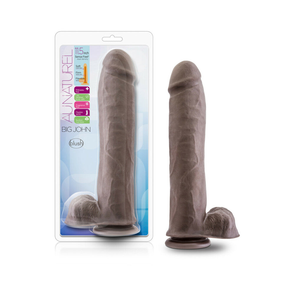 Au Naturel Big John 11.5 in. Posable Dual Density Dildo with Balls Brown Blush Au Naturel Big John dark-brown dildo beside clear retail package