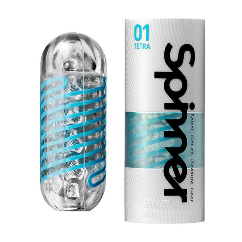 Tenga Spinner 01 Tetra clear capsule with cyan spiral ribs beside silver-and-cyan cylindrical carton