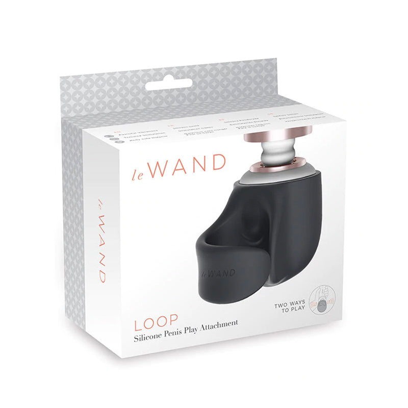 Le Wand Loop Silicone Penis Play Attachment Le Wand Loop black silicone attachment white hanging box with black contoured sleeve fitted over a white wand head