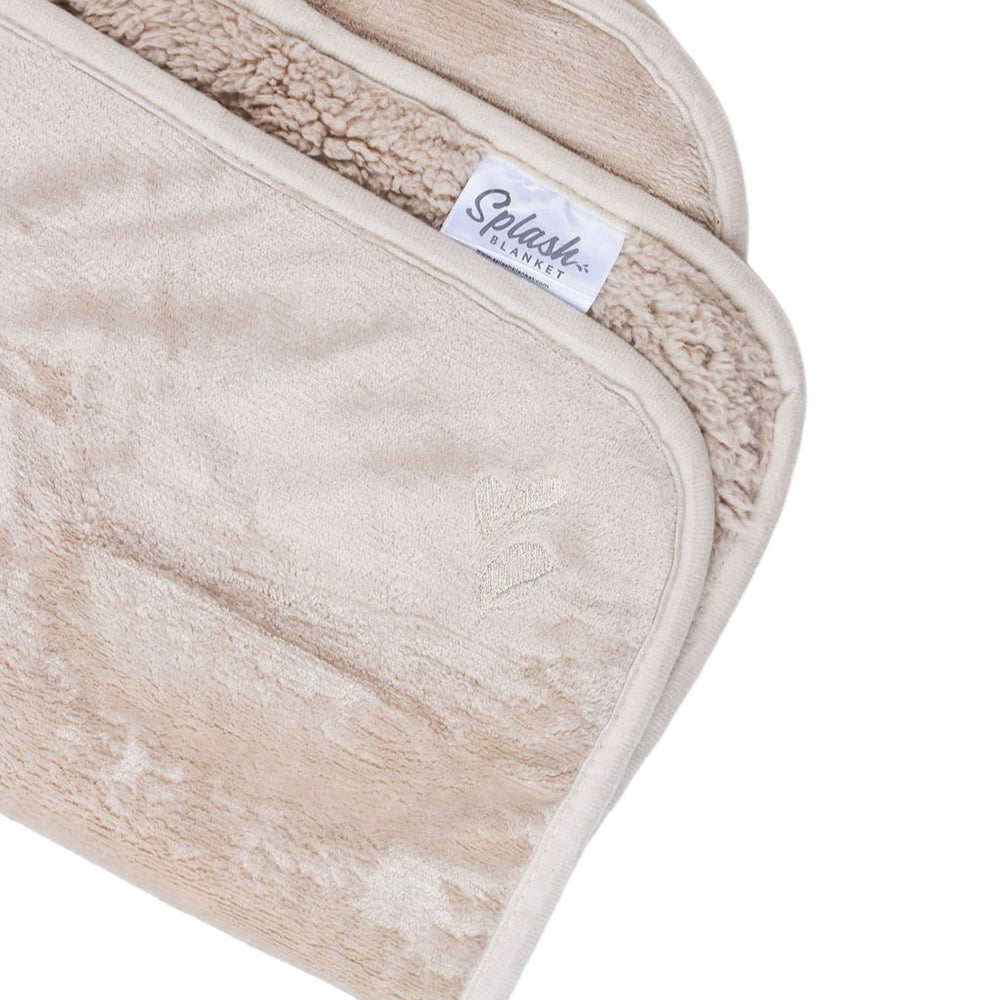 Splash Blanket The OG Medium Champagne Splash Blanket The OG medium champagne blanket corner close-up with textured reverse