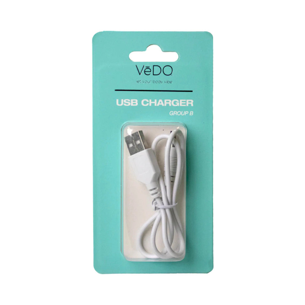 VeDO USB Charger B VeDO USB Charger B white coiled cable on teal retail card