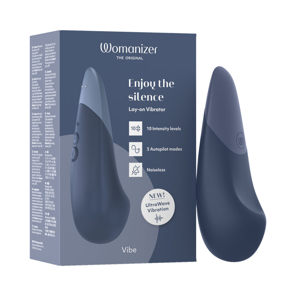 Womanizer Vibe Dark Blue dark blue Womanizer Vibe vibrator standing beside matching retail box