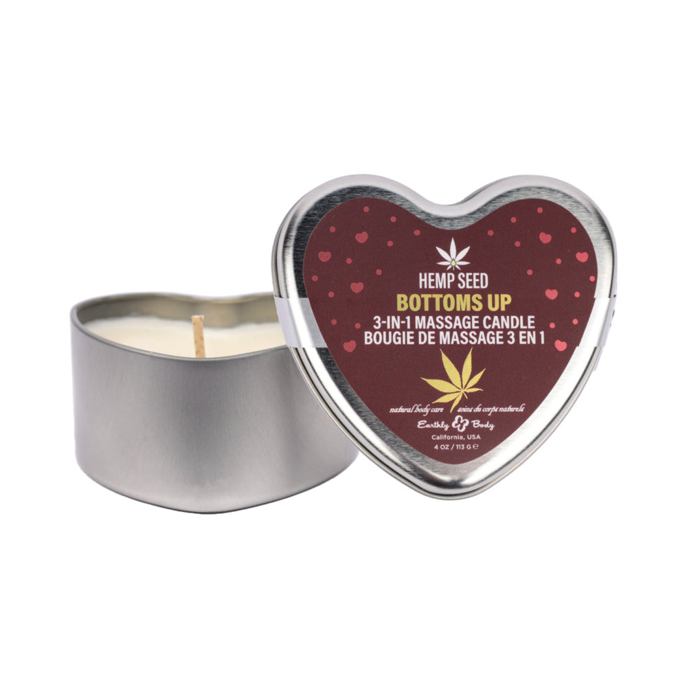 Earthly Body Hemp Seed Valentine 3-in-1 Massage Candle Bottom''s Up 4.7 oz. open silver heart tin of Earthly Body Bottoms Up candle beside lid