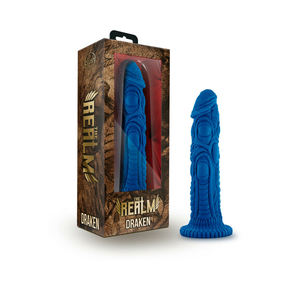 The Realm Draken 7.5 in. Silicone Lock On Fantasy Dildo Blue Blush Realm Draken blue fantasy dildo beside brown dragon-themed retail box