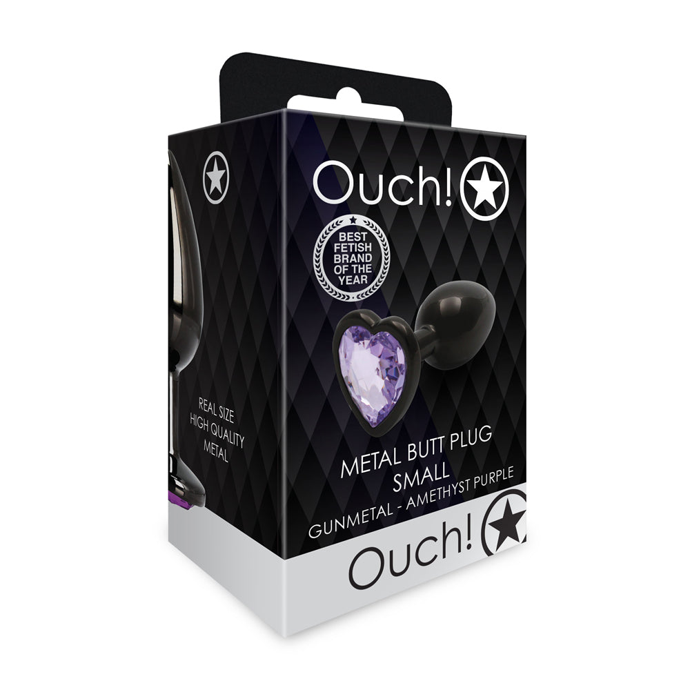 Ouch! Heart Gem Butt Plug Small Gunmetal/Amethyst Shots Ouch small gunmetal butt plug with amethyst heart gem angled front retail package