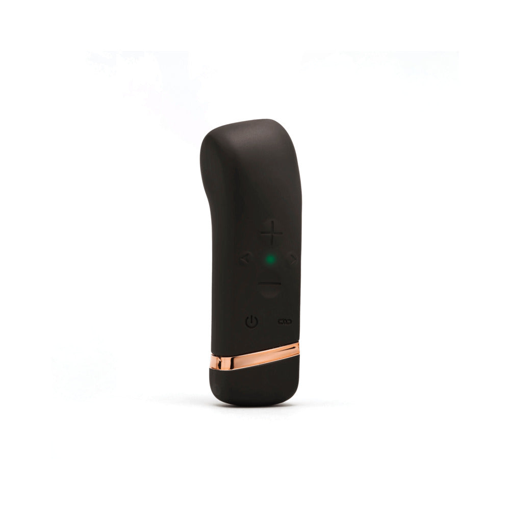 The Oh! The Oh black controller standing upright with gold trim