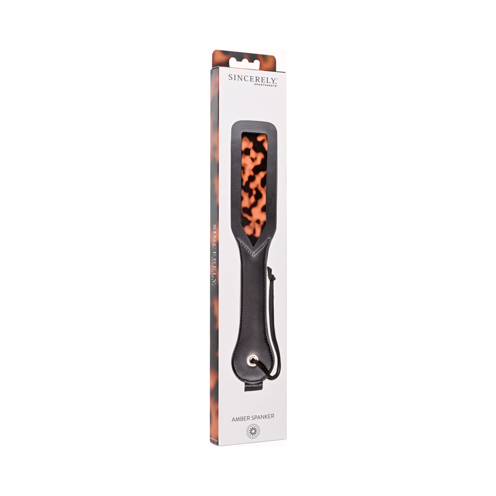 Sincerely, Sportsheets Amber Layered Spanker Tortoiseshell Sportsheets Amber layered black spanker retail package