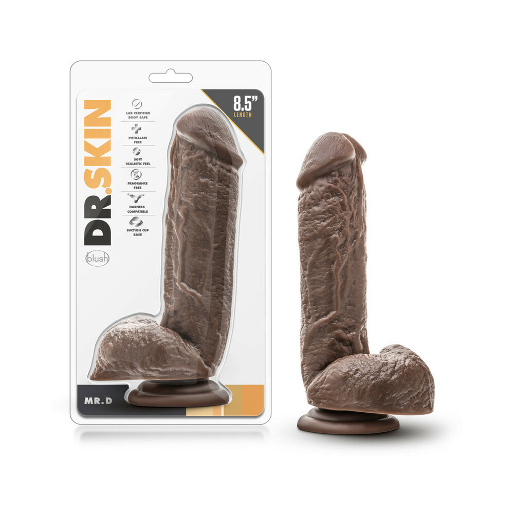 Dr. Skin Mr. D Realistic 8.5 in. Dildo with Balls Brown Blush Dr. Skin Mr. D Brown 8.5 Inch Dildo beside clear retail package
