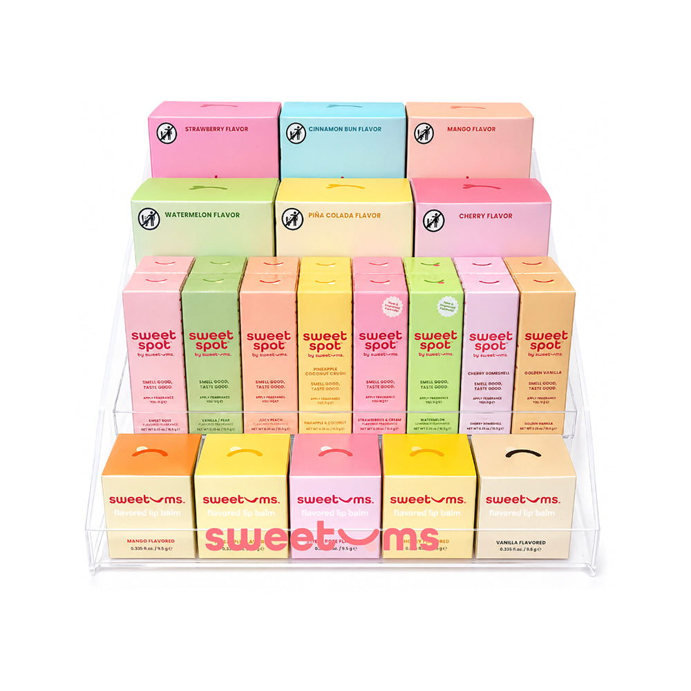 Sweetums Display Assortment Sweetums pastel intimate-care countertop display assortment with rows of pastel boxes and packets arranged in a white tray