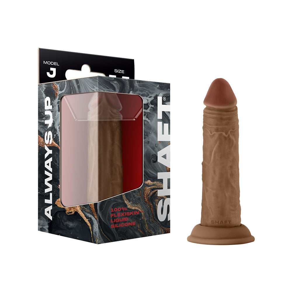 Shaft Model J: 5.5 in. Dual Density Silicone Dildo Oak oak-toned Shaft Model J textured silicone dildo beside black retail box