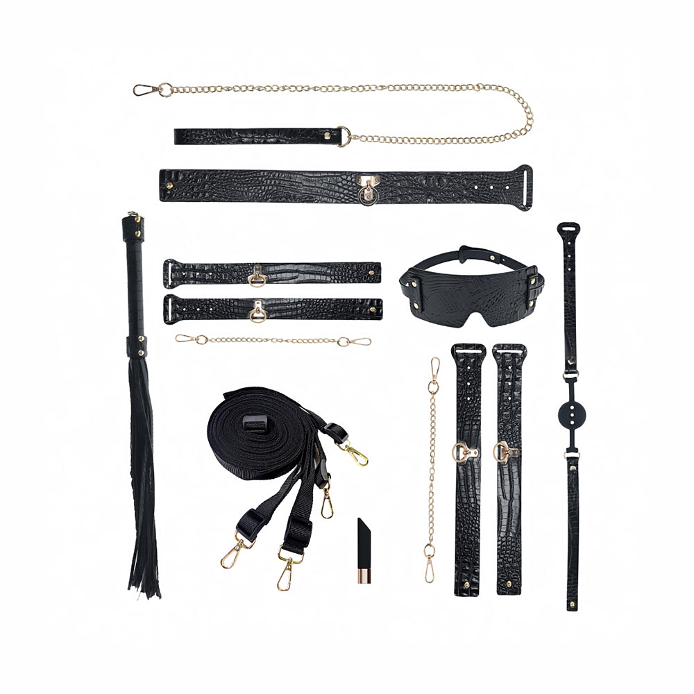 Ouch! International Rome Collection Kit with Bag black croc-print Rome restraint pieces chains straps and flogger arranged together