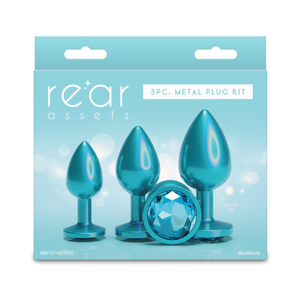 Rear Assets Trainer Plug Kit Iridescent Teal/Teal Teal Rear Assets three-piece aluminum plug kit with matching jewel bases