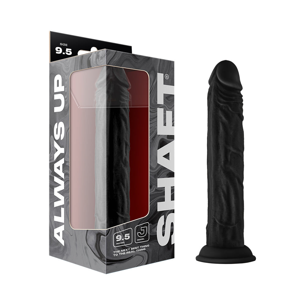 Shaft Model J 9.5 in. Liquid Silicone Dong Black Shaft Model J 9.5-inch black dong beside gray retail box