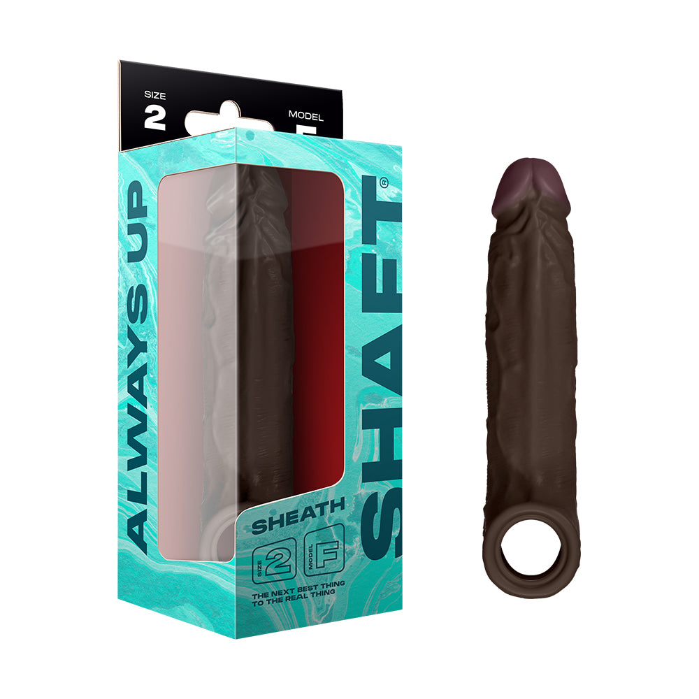 Shaft Model F: Sheath Mahogany Size 2 Mahogany Size 2 Shaft Model F deep brown silicone sheath beside aqua box