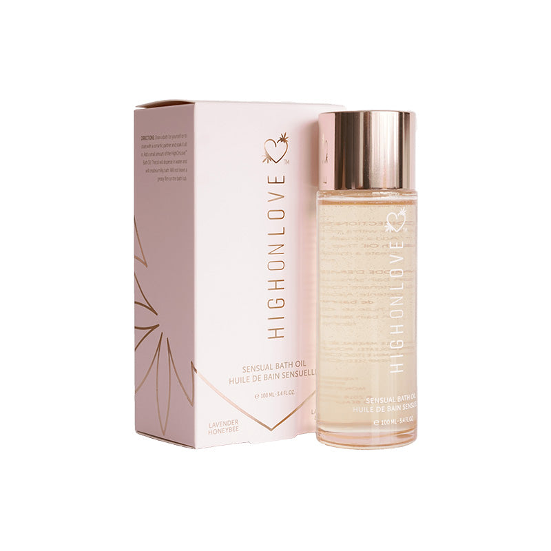 HighOnLove Bath Oil Lavendar Honeybee HighOnLove Lavender Honeybee bath oil in clear bottle beside pink carton