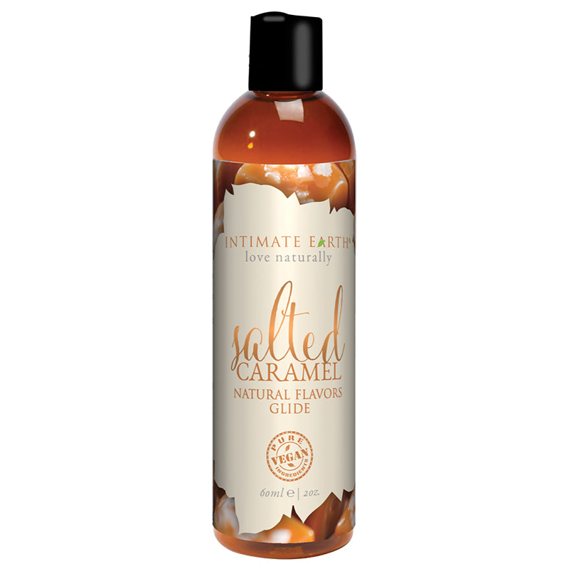 Intimate Earth Salted Caramel Pleasure Glide 60 ml/2 oz Intimate Earth Salted Caramel 2-ounce liquid upright bottle with black cap and cream caramel label