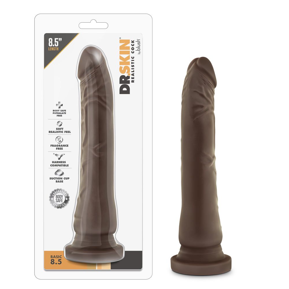 Dr. Skin Basic 8.5 Realistic 8.5 in. Dildo Brown Blush Dr. Skin Basic Brown 8.5 Inch Dildo beside clear retail package