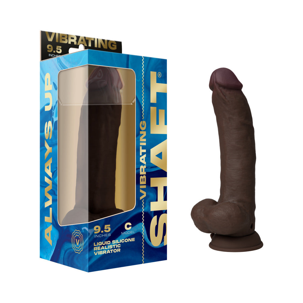 Shaft Vibrating Model C: 9.5 in. Dual Density Silicone Dildo Mahogany Shaft Model C mahogany silicone vibrator beside blue windowed retail box