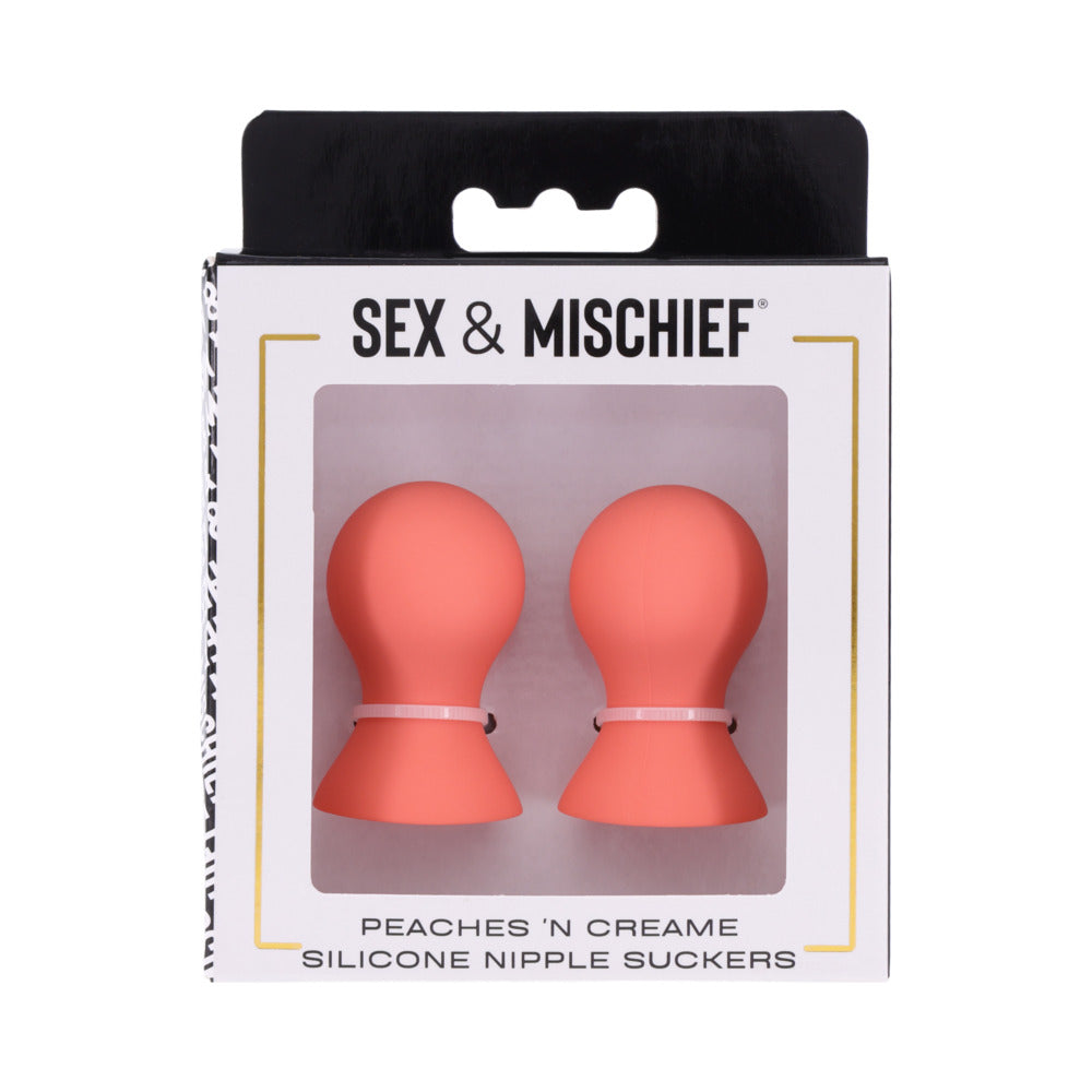 Sportsheets Sex & Mischief Peaches ''n CreaMe Silicone Nipple Suckers Coral-orange Peaches 'n Cream silicone suckers in window box