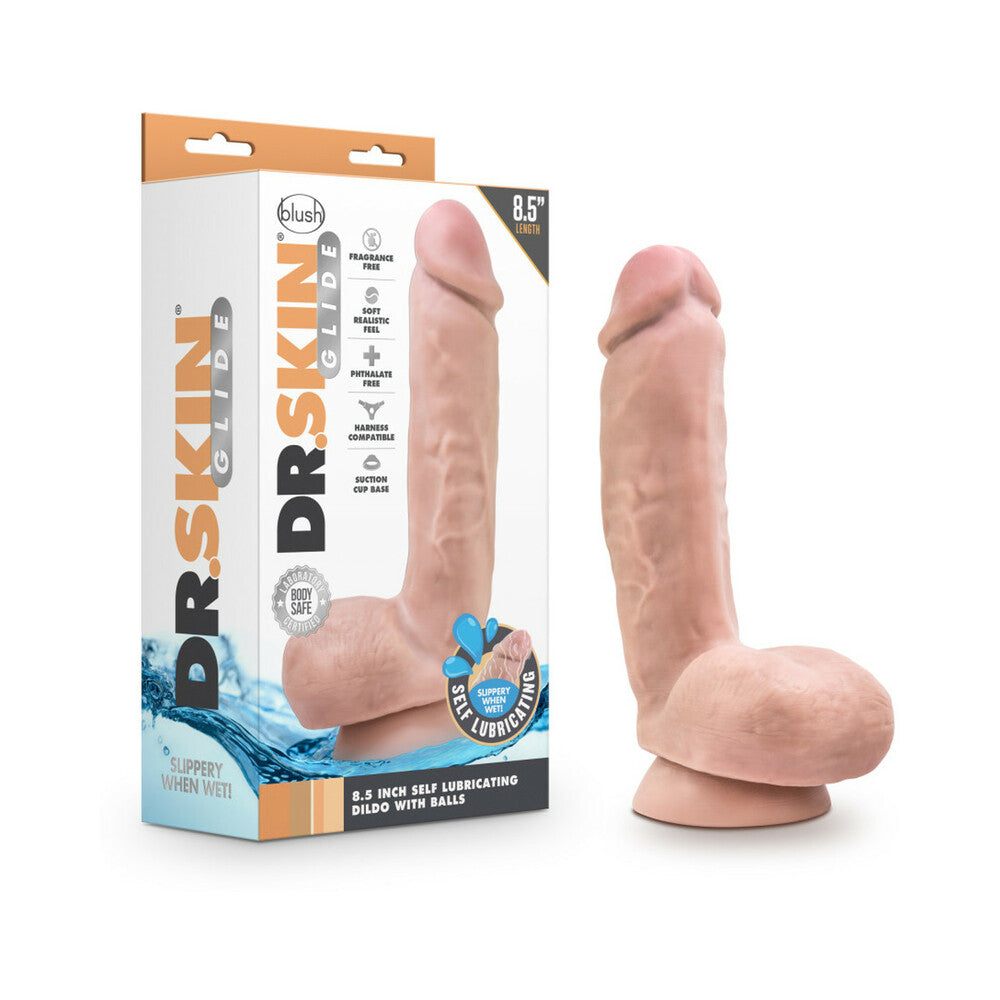 Dr. Skin Glide Realistic 8.5 in. Self-Lubricating Dildo with Balls Beige Beige Dr. Skin Glide dildo beside orange and white retail box