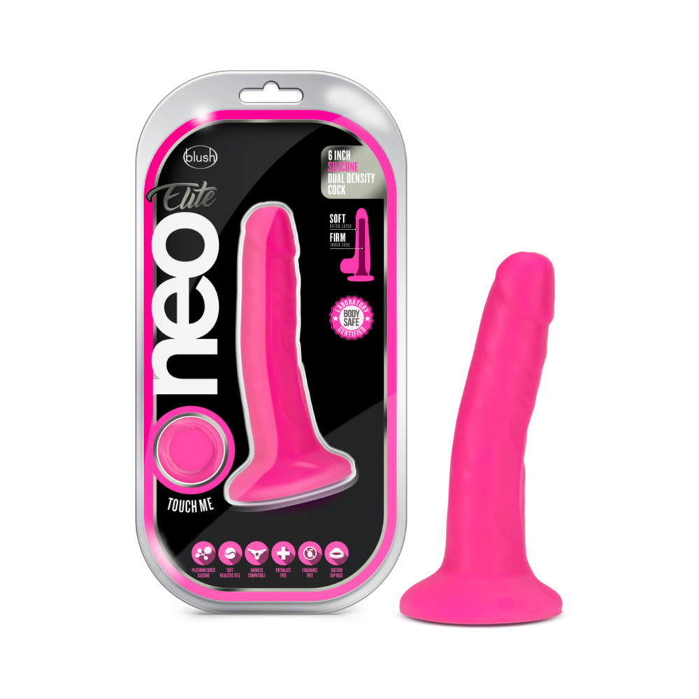 Neo Elite 6 in. Silicone Dual Density Dildo Neon Pink Neon pink Neo Elite dildo beside clear black-and-pink package