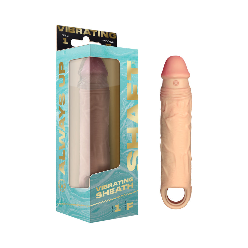 Shaft Vibrating Model F: Sheath Size 1 Pine Pine flesh-tone Shaft Model F vibrating sheath beside turquoise box