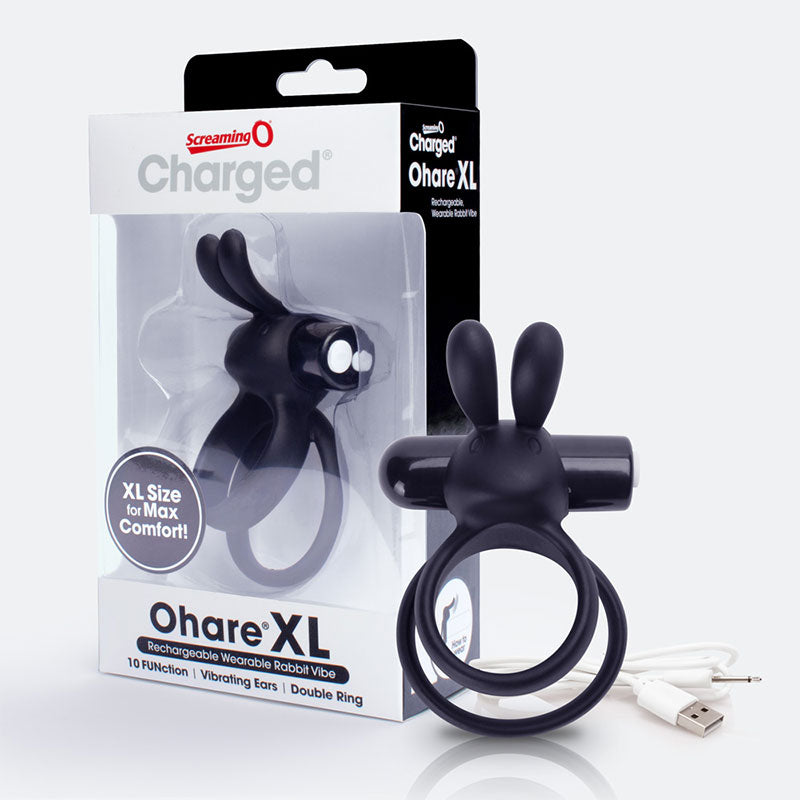 Screaming O Charged Ohare XL - Black Screaming O Charged Ohare XL black ring beside clear retail package with twin ears, double loops and white USB cable