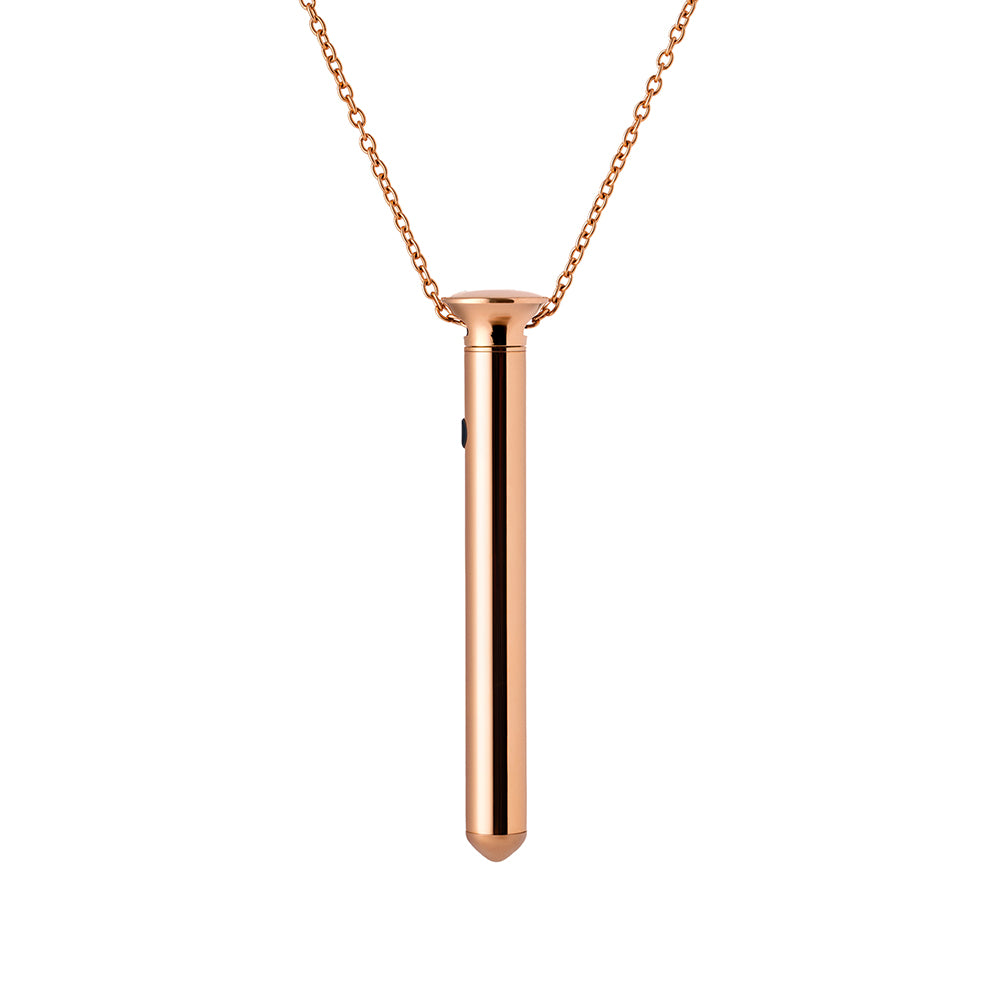 Crave Vesper Mini Rose Gold Rose gold Crave Vesper Mini pendant vibrator hanging from chain
