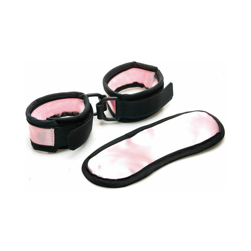 Sex Kitten Mask & Cuff Set Pink/Black light pink satin eye mask and two cuffs with black trim and silver hardware