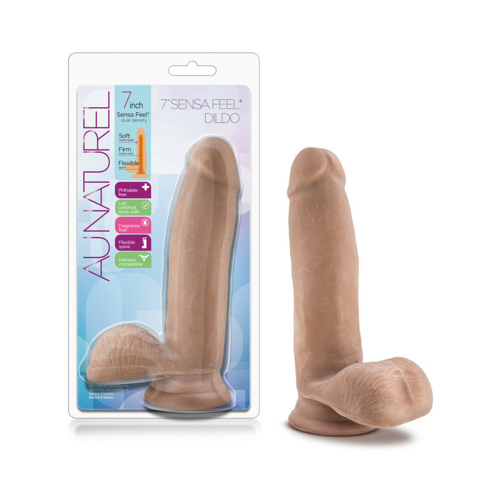 Au Naturel 7 in. Posable Dual Density Dildo with Balls Tan Au Naturel Tan 7 Inch Dildo beside blue white retail blister