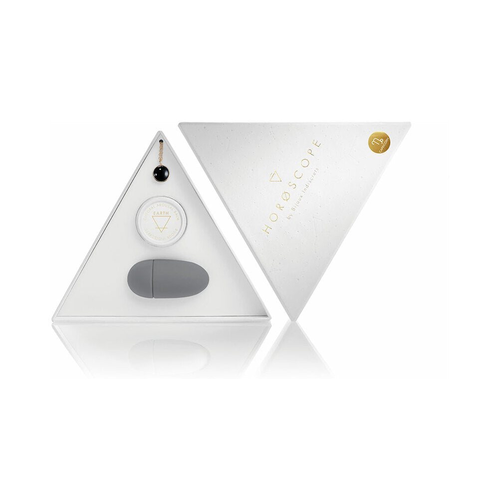 Bijoux Indiscrets Horoscope Kit Capricorn open white Capricorn Horoscope kit with black stone necklace balm and gray finger vibrator
