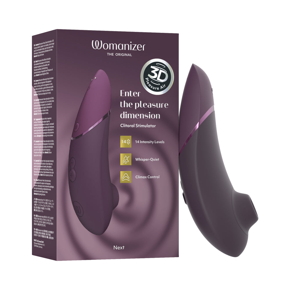 Womanizer Next Dark Purple dark purple Womanizer Next curved air stimulator beside its matching purple retail box