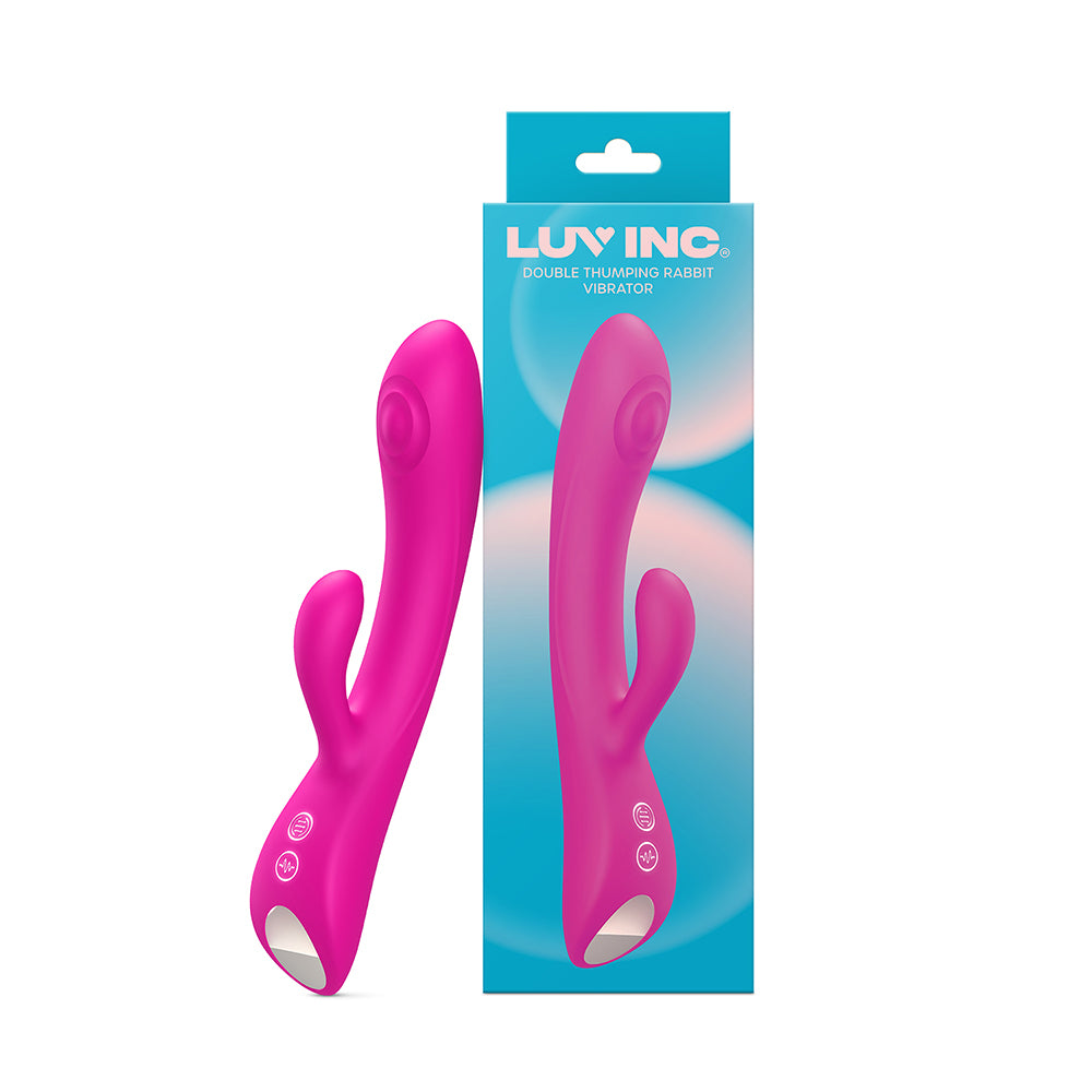 Luv Inc Dr42: Double Thumping Rabbit Vibrator Pink Hot-pink Luv Inc DR42 dual-arm rabbit vibrator displayed beside teal package