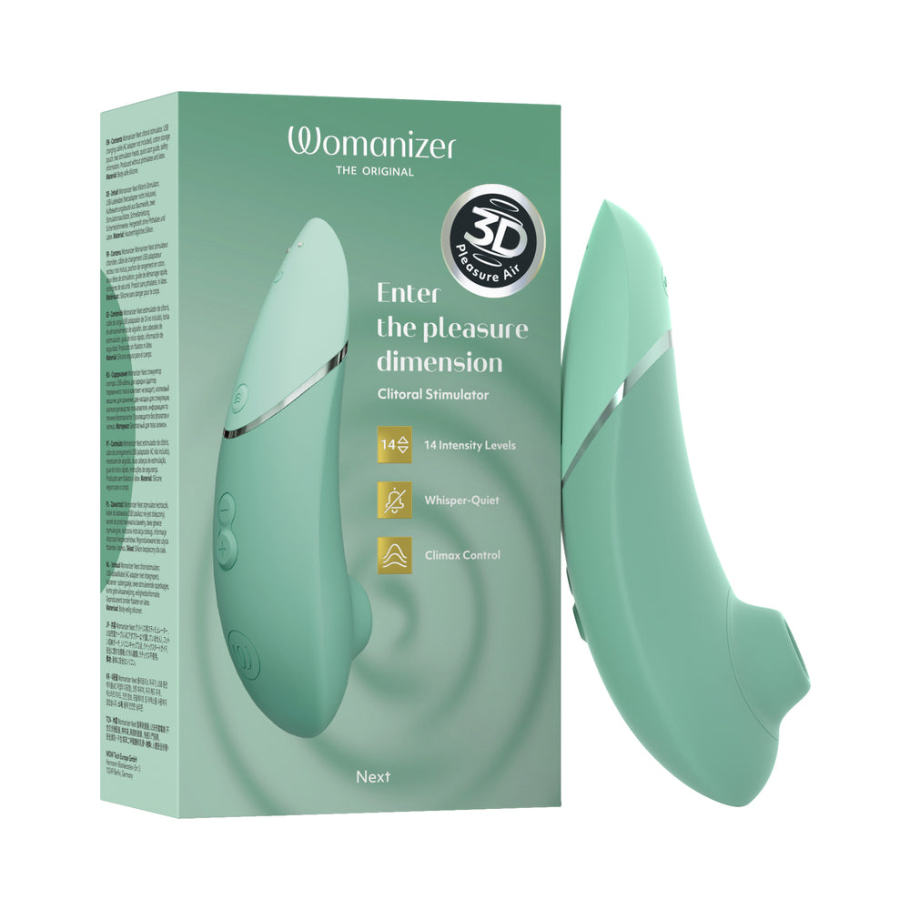 Womanizer Next Sage sage-green Womanizer Next curved air stimulator beside its pale green retail box