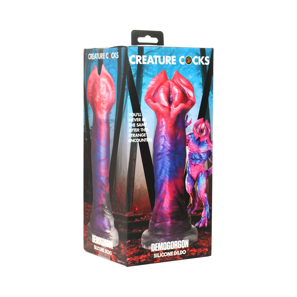Creature Cocks Demogorgon Silicone Dildo Creature Cocks Demogorgon multicolor dildo with flared red head pictured on blue monster-themed box