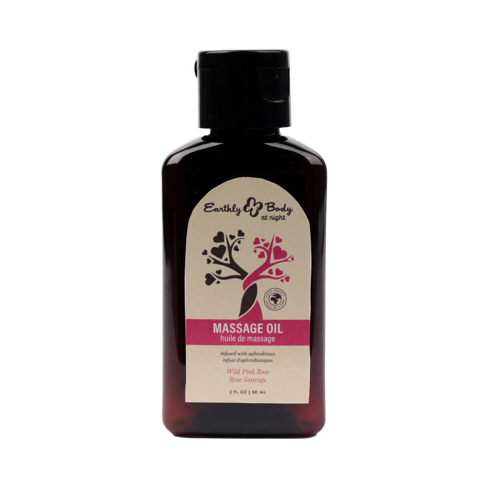 Earthly Body At Night Aphrodisiac Massage Oil Wild Pink Rose 2 oz. Front of Earthly Body wild pink rose massage oil 2 oz bottle