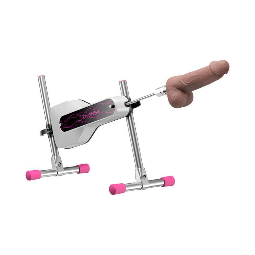 Lovense Mini Sex Machine Lovense Mini Sex Machine on silver adjustable frame with pink feet