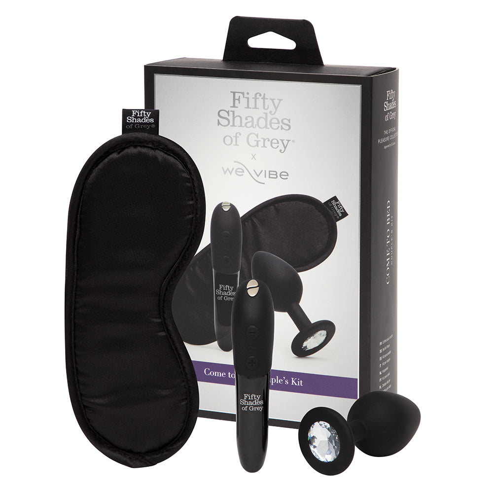 Fifty Shades of Grey We-Vibe Come to Bed Kit Black Fifty Shades We-Vibe Come to Bed black two-toy kit beside retail box with Tango X bullet and crystal plug