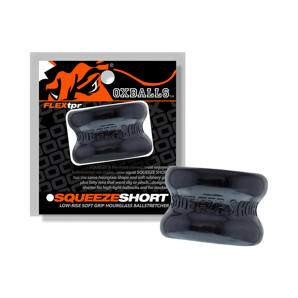 Oxballs Squeeze Short Ballstretcher Black Black Oxballs Squeeze Short beside black-and-orange retail package